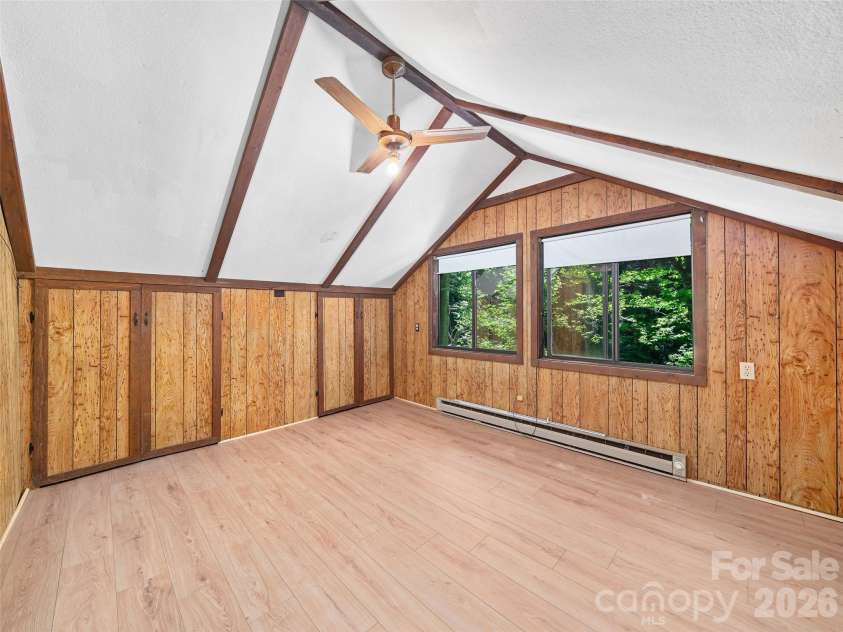 552 Fork Road, Burnsville, NC 28714.  MLS# CAR4395564, YatesRealty ID 32097. Upper Bedroom 2 facing creek 