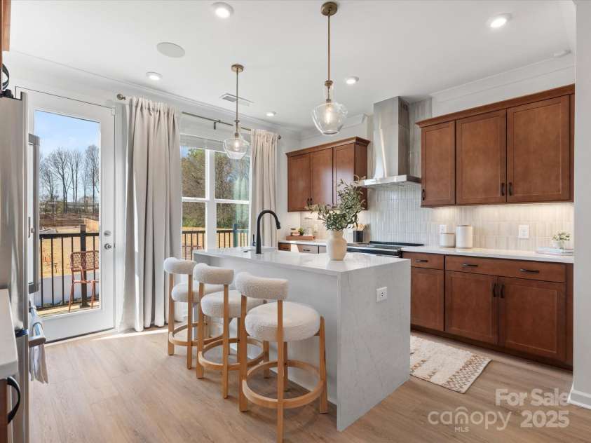 5636 Kingspan Drive, Charlotte, NC 28217.  MLS# CAR4211544, YatesRealty ID 32097. Roan Model Home Kitchen | Southmont *actual finishes, color scheme, orientation vary on this home. Furniture not included