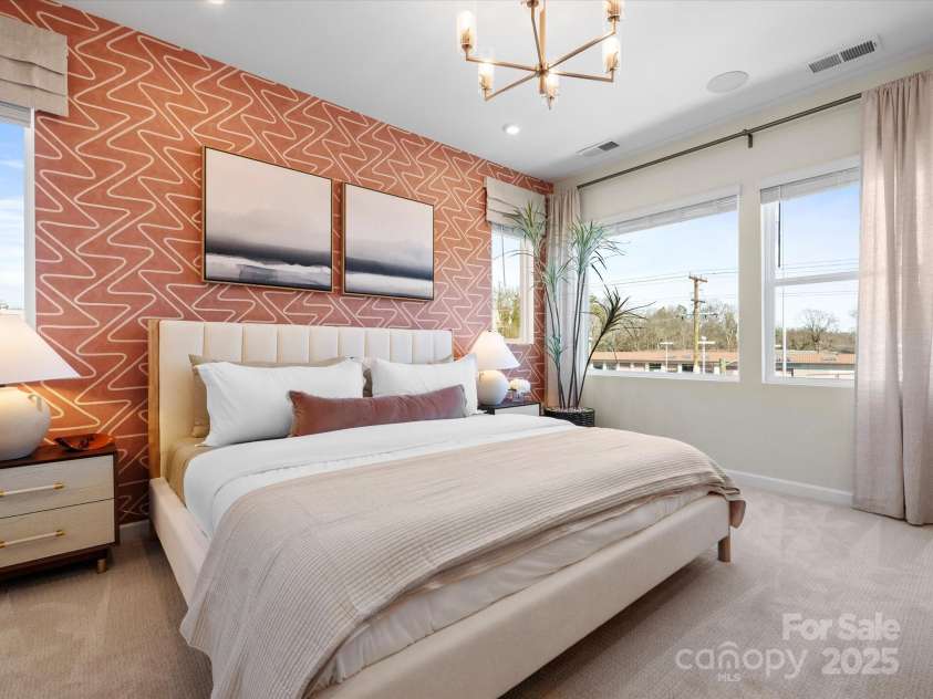 5636 Kingspan Drive, Charlotte, NC 28217.  MLS# CAR4211544, YatesRealty ID 32097. Roan Model Home Primary Bed | Southmont *actual finishes, color scheme, orientation vary on this home. Furniture not included