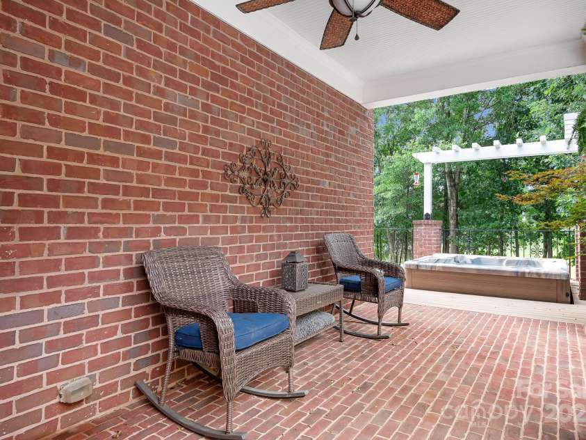 14138 Timbergreen Drive, Huntersville, NC 28078.  MLS# CAR4277542, YatesRealty ID 32099. Side porch to watch basketball