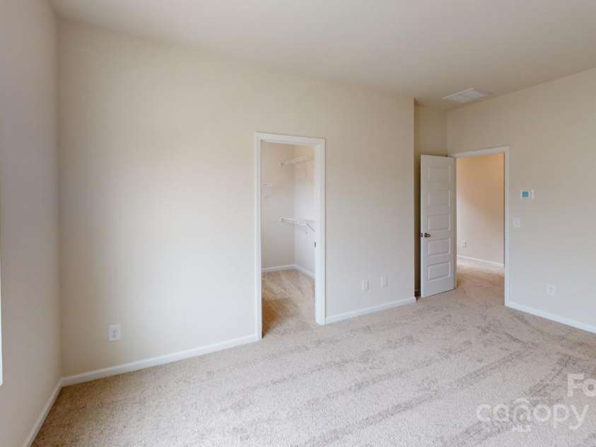 2547 Ruby Dixon Crossing Drive, Gastonia, NC 28056.  MLS# CAR4266093, YatesRealty ID 32103. Photo is representational - Primary bedroom