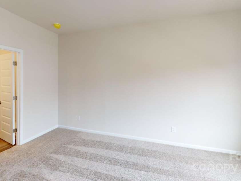 2547 Ruby Dixon Crossing Drive, Gastonia, NC 28056.  MLS# CAR4266093, YatesRealty ID 32103. Photo is representational - Primary bedroom