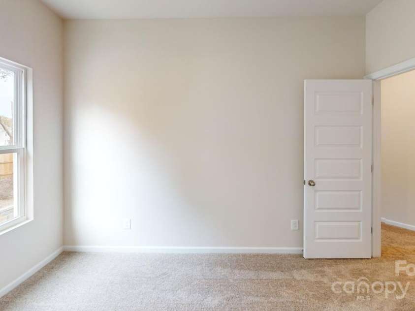 2547 Ruby Dixon Crossing Drive, Gastonia, NC 28056.  MLS# CAR4266093, YatesRealty ID 32103. Photo is representational - Secondary bedroom