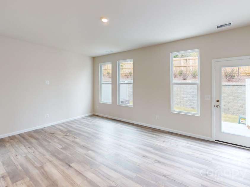 2547 Ruby Dixon Crossing Drive, Gastonia, NC 28056.  MLS# CAR4266093, YatesRealty ID 32103. Photo is representational - Spacious great room
