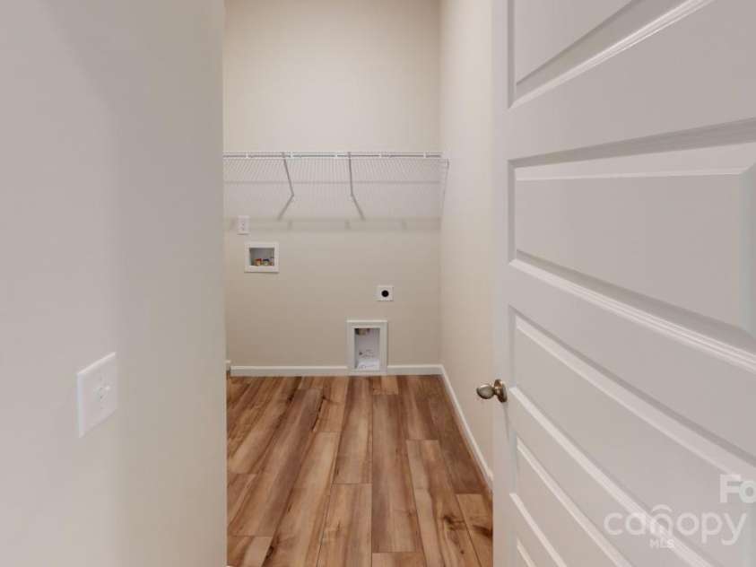 2547 Ruby Dixon Crossing Drive, Gastonia, NC 28056.  MLS# CAR4266093, YatesRealty ID 32103. Photo is representational - Walk-in laundry room upstairs near all bedrooms