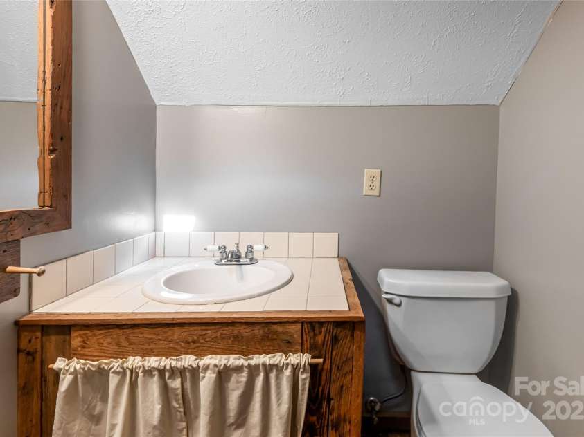 65 Woodfern Drive, Maggie Valley, NC 28751.  MLS# CAR4271866, YatesRealty ID 32107. 