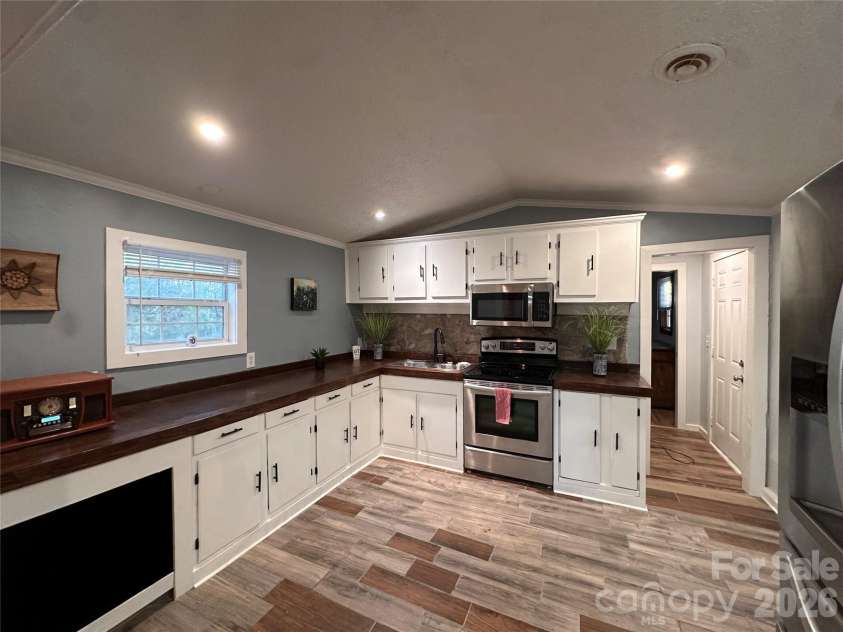 113 Highlander Street, Morganton, NC 28655.  MLS# CAR4220789, YatesRealty ID 3211. Custom Kitchen w/ Beautiful Tile Floors