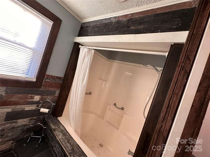 113 Highlander Street, Morganton, NC 28655.  MLS# CAR4220789, YatesRealty ID 3211. Full Custom Tile Work