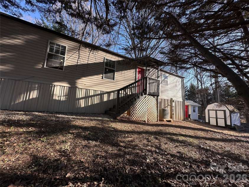 113 Highlander Street, Morganton, NC 28655.  MLS# CAR4220789, YatesRealty ID 3211. Side Door To Sheds & Firepit Area