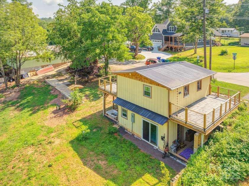 153 Vinewood Circle, Asheville, NC 28806.  MLS# CAR4278803, YatesRealty ID 32113. Great photo of the back of the house and its 
