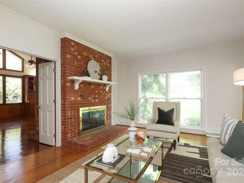 1928 Providence Road, Charlotte, NC 28211.  MLS# CAR4271253, YatesRealty ID 32117. Family room with fireplace