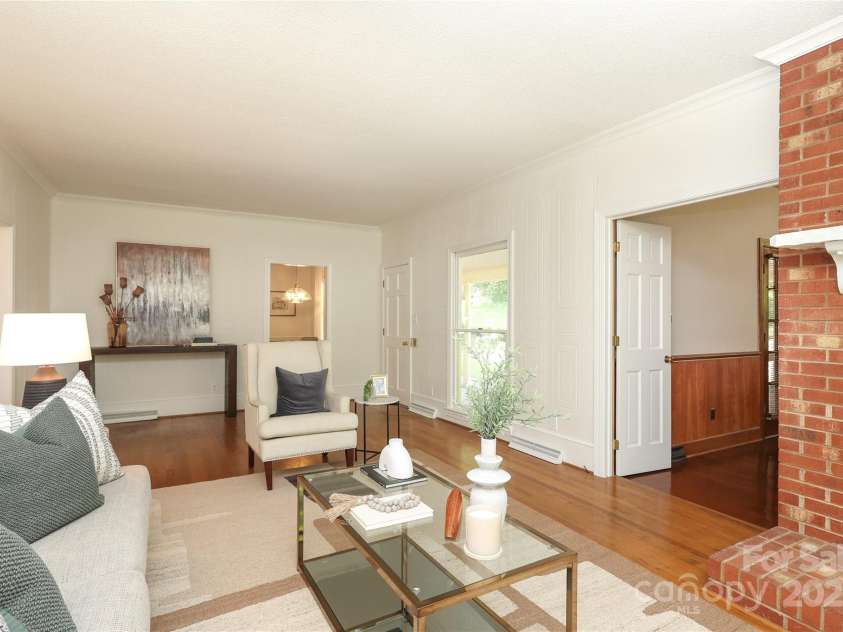 1928 Providence Road, Charlotte, NC 28211.  MLS# CAR4271253, YatesRealty ID 32117. Family room with fireplace