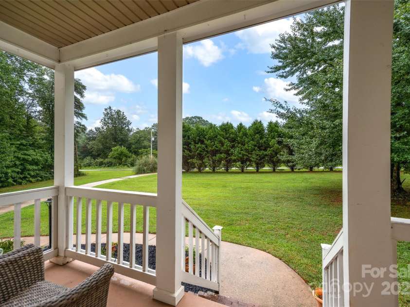 165 Larue Circle, Statesville, NC 28625.  MLS# CAR4283964, YatesRealty ID 32121. Private view from front porch
