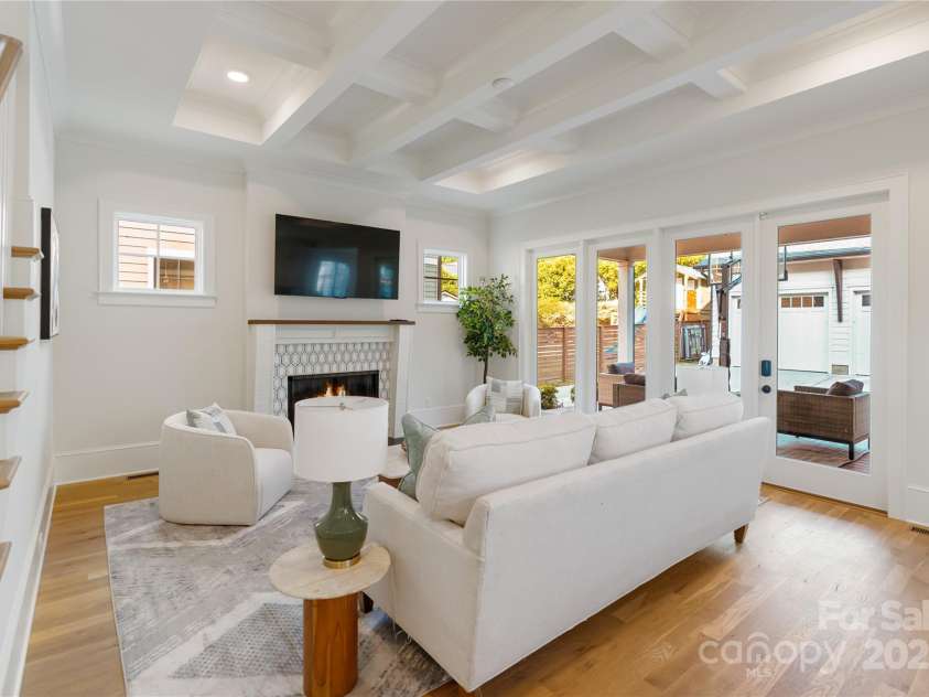 508 Mcalway Road, Charlotte, NC 28211.  MLS# CAR4273881, YatesRealty ID 32122. Living room with four large glass doors