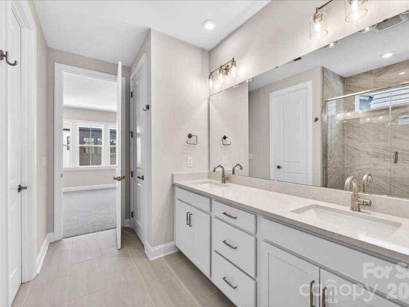12015 Elsa Lane, Charlotte, NC 28277.  MLS# CAR4396074, YatesRealty ID 32126. Ample storage with cabinets with drawers