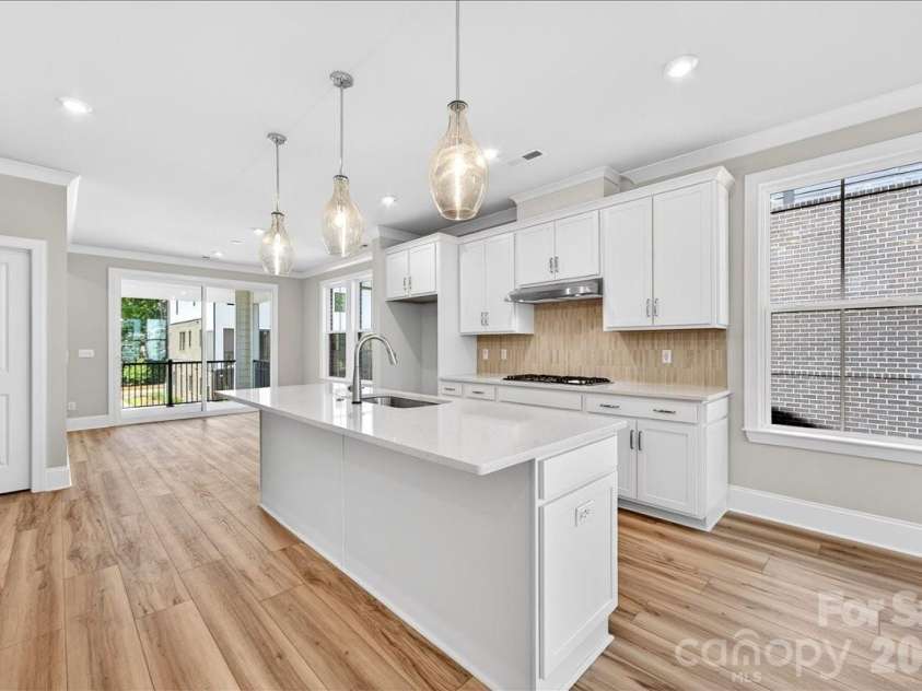12015 Elsa Lane, Charlotte, NC 28277.  MLS# CAR4396074, YatesRealty ID 32126. Gourmet kitchen with white cabinets