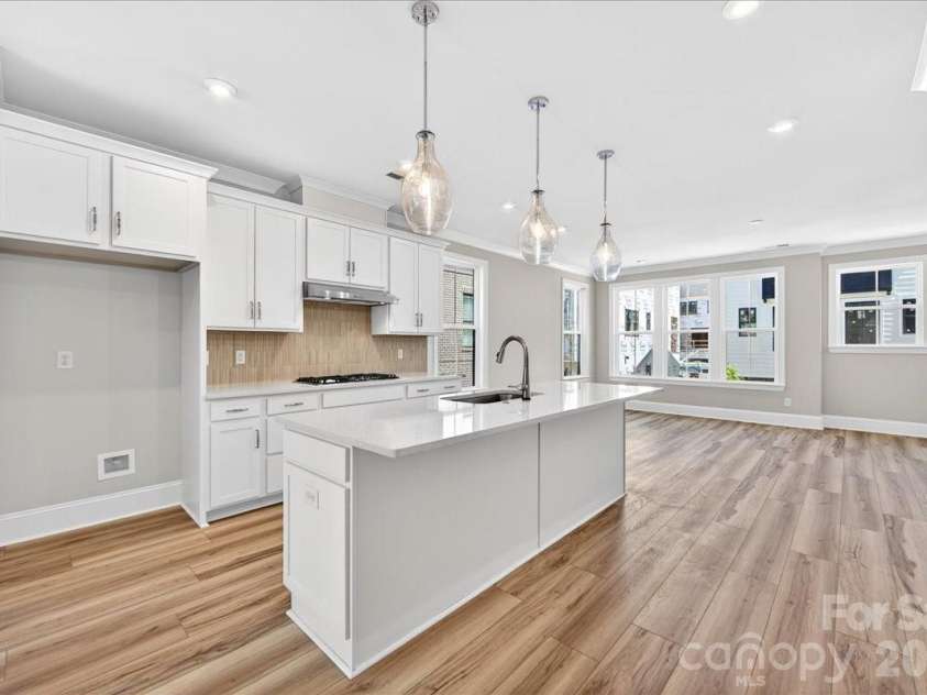 12015 Elsa Lane, Charlotte, NC 28277.  MLS# CAR4396074, YatesRealty ID 32126. Light filled Gourmet kitchen