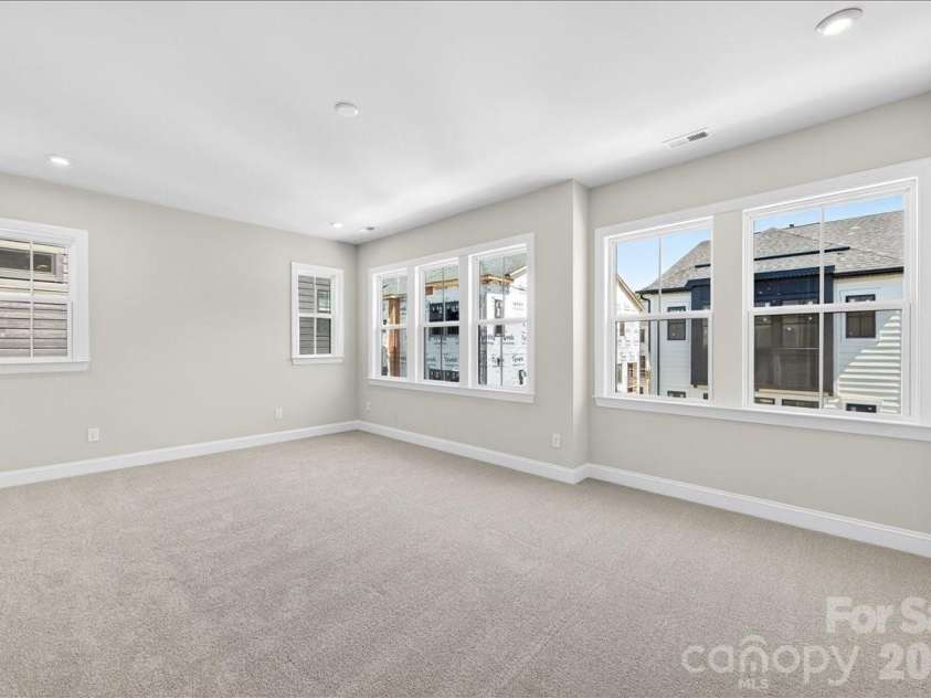 12015 Elsa Lane, Charlotte, NC 28277.  MLS# CAR4396074, YatesRealty ID 32126. Primary Bedroom with ample windows for natural light