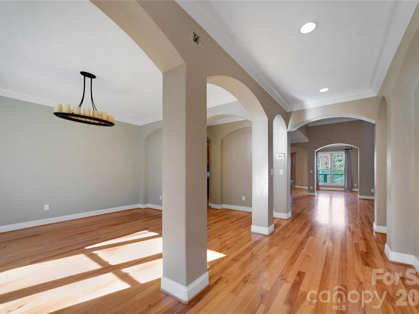 886 Soquili Drive, Brevard, NC 28712.  MLS# CAR4316756, YatesRealty ID 3213. Foyer with Dining room on left