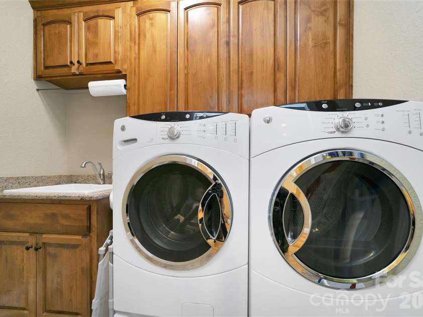886 Soquili Drive, Brevard, NC 28712.  MLS# CAR4316756, YatesRealty ID 3213. Laundry room w/utility suite