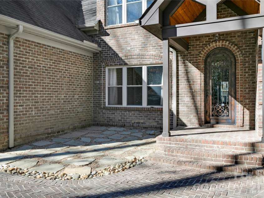886 Soquili Drive, Brevard, NC 28712.  MLS# CAR4316756, YatesRealty ID 3213. Patio recently refurbished