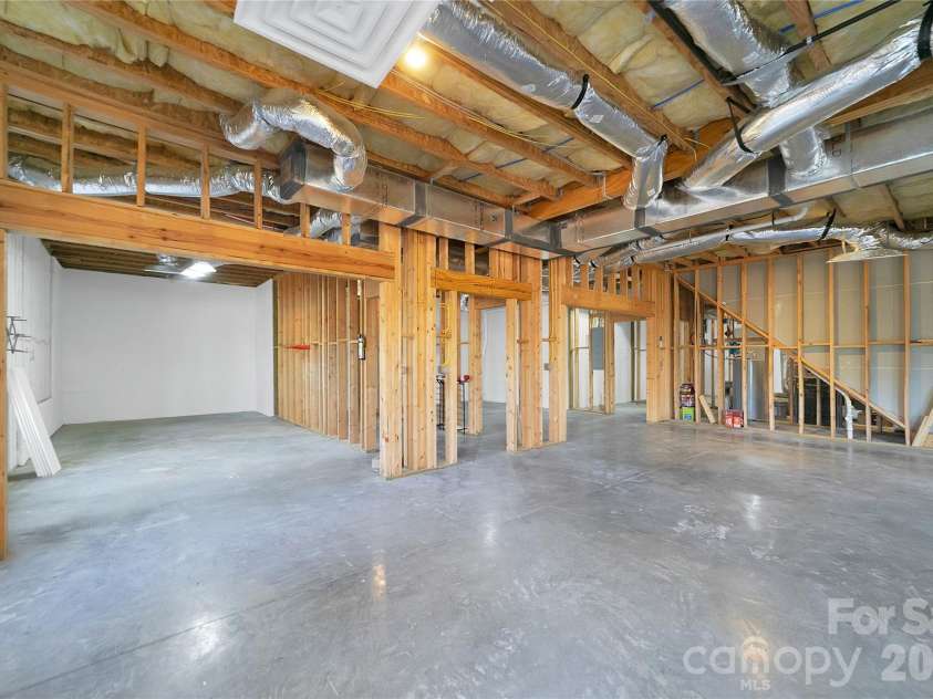 886 Soquili Drive, Brevard, NC 28712.  MLS# CAR4316756, YatesRealty ID 3213. Plumbed for 1/2 bath & wet bar