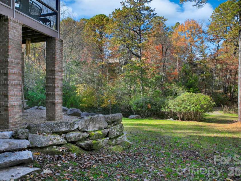886 Soquili Drive, Brevard, NC 28712.  MLS# CAR4316756, YatesRealty ID 3213. View to the back yard