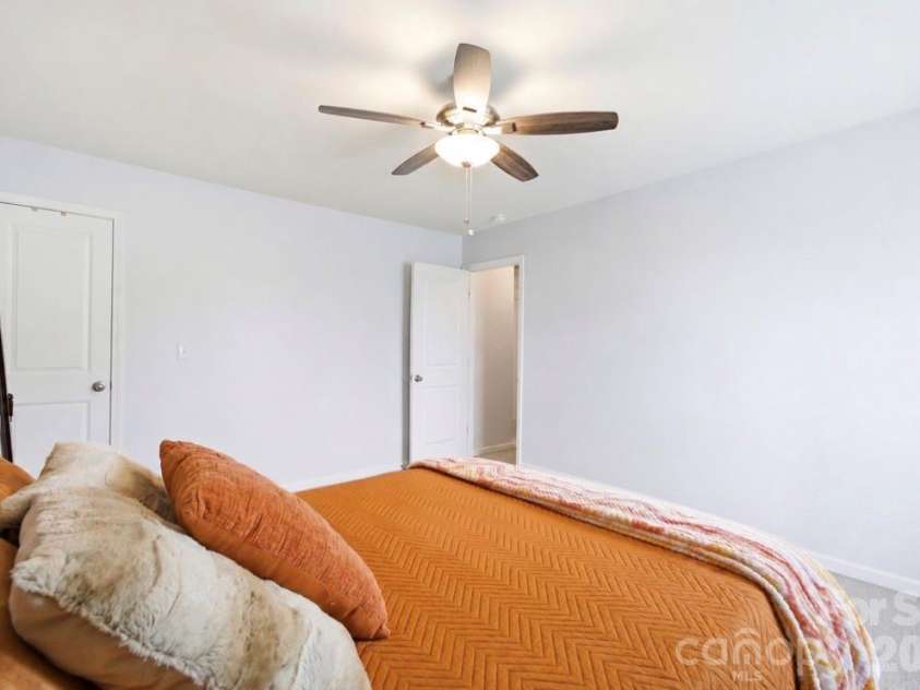 8502 Mansell Court, Charlotte, NC 28215.  MLS# CAR4395611, YatesRealty ID 32130. “Virtually staged using AI. No structural changes have been made.“