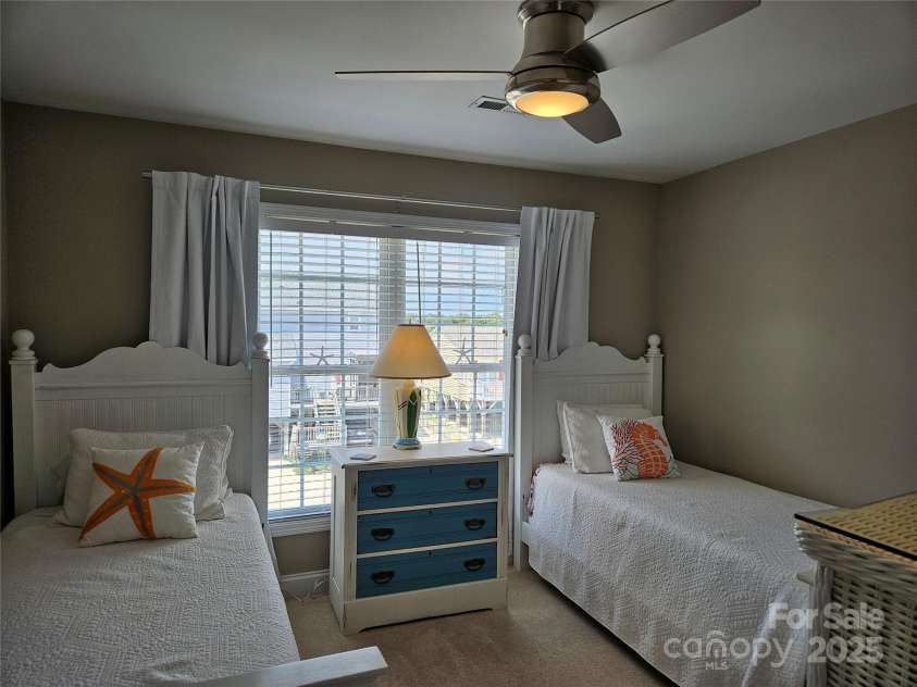 281 Brunswick Avenue, Holden Beach, NC 28462.  MLS# CAR4289276, YatesRealty ID 32135. Guest BR has walk in closet