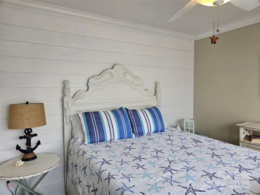 281 Brunswick Avenue, Holden Beach, NC 28462.  MLS# CAR4289276, YatesRealty ID 32135. Main level Guest BR