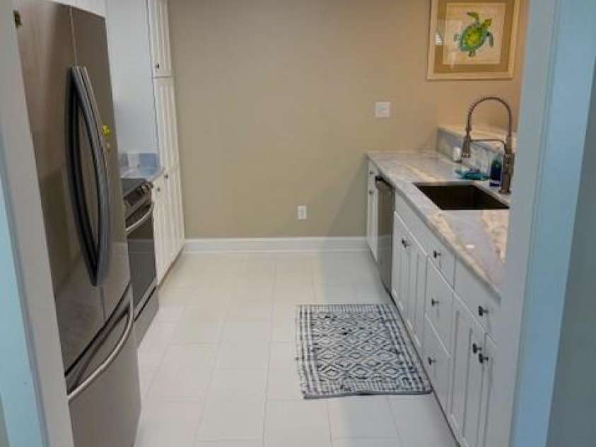 281 Brunswick Avenue, Holden Beach, NC 28462.  MLS# CAR4289276, YatesRealty ID 32135. New Kitchen Tile