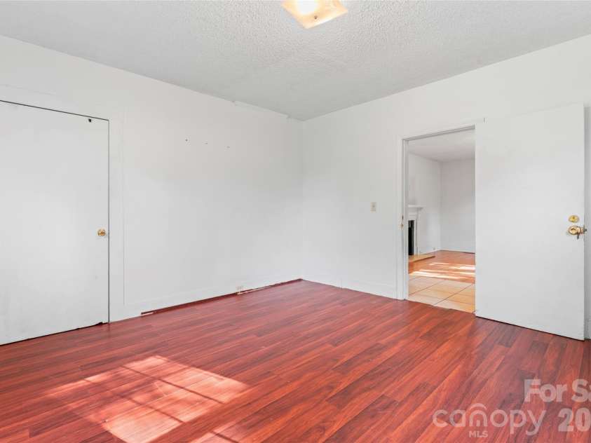 317 Campus Street, Charlotte, NC 28216.  MLS# CAR4329279, YatesRealty ID 3214. Bedroom 1 off Living Room