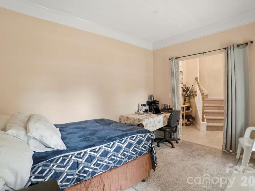 5619 Hedgecrest Place, Charlotte, NC 28269.  MLS# CAR4396327, YatesRealty ID 32141. Office space in main level currently being used as bedroom
