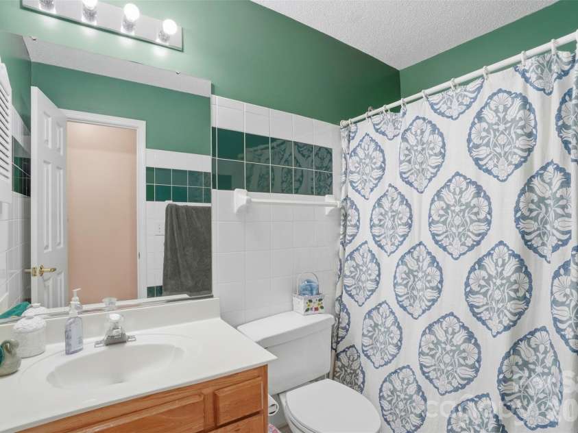 5619 Hedgecrest Place, Charlotte, NC 28269.  MLS# CAR4396327, YatesRealty ID 32141. Second full bathroom upstairs