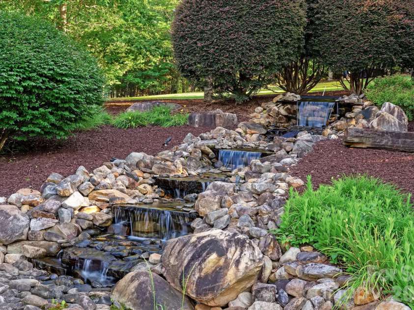 745 Mossy Oak Trail, Nebo, NC 28761.  MLS# CAR4396090, YatesRealty ID 32142. Community Waterfall