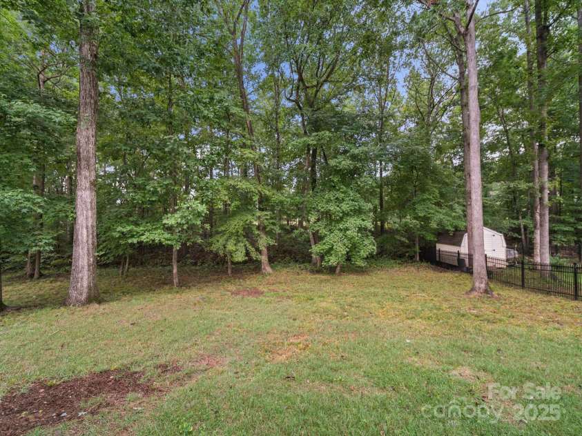 9002 Fenwick Drive, Indian Trail, NC 28079.  MLS# CAR4287627, YatesRealty ID 32142. Backyard