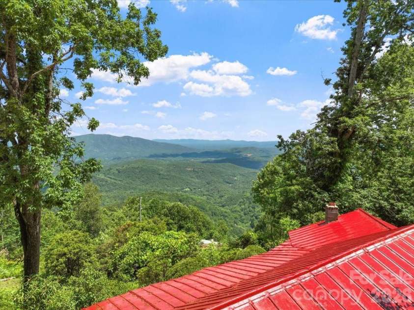 8709 Hwy 226A Highway, Little Switzerland, NC 28749.  MLS# CAR4396070, YatesRealty ID 32146. 