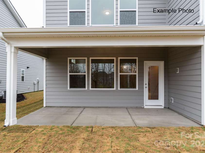 102 Oakham Place, Mooresville, NC 28115.  MLS# CAR4290246, YatesRealty ID 32148. Example Photo - Rear Covered Patio