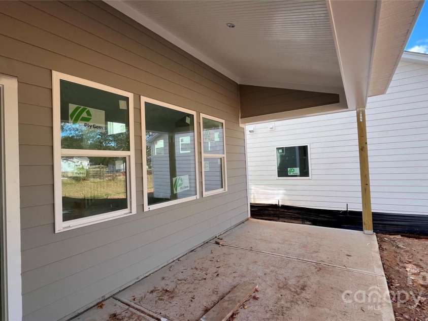 102 Oakham Place, Mooresville, NC 28115.  MLS# CAR4290246, YatesRealty ID 32148. Rear Covered Patio