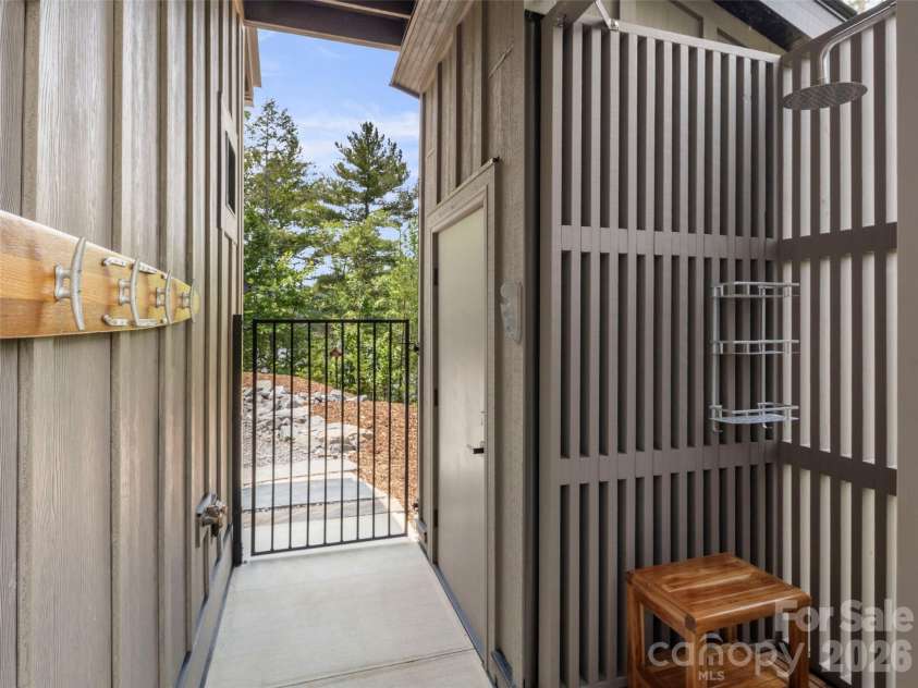 425 Dockside Drive, Nebo, NC 28761.  MLS# CAR4393009, YatesRealty ID 32158. Incredible outdoor shower.