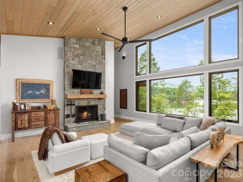 425 Dockside Drive, Nebo, NC 28761.  MLS# CAR4393009, YatesRealty ID 32158. Main living with cozy fireplace.