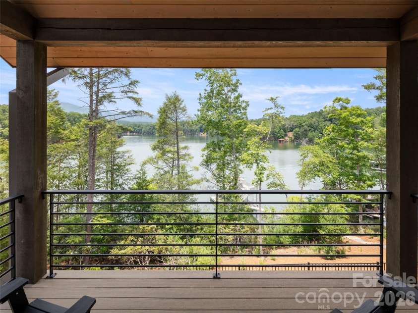 425 Dockside Drive, Nebo, NC 28761.  MLS# CAR4393009, YatesRealty ID 32158. Private lakeview balcony off primary suite.