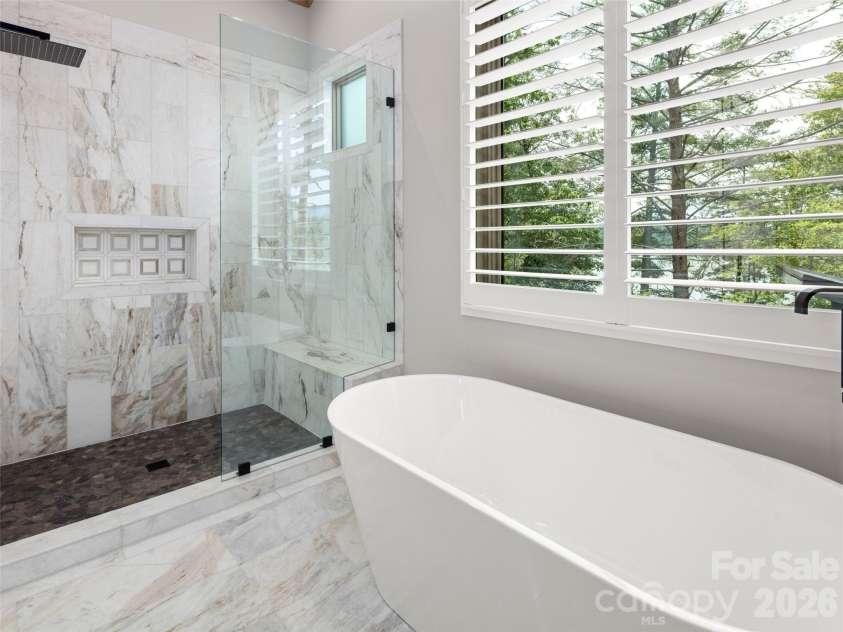 425 Dockside Drive, Nebo, NC 28761.  MLS# CAR4393009, YatesRealty ID 32158. Spa-like primary bath.