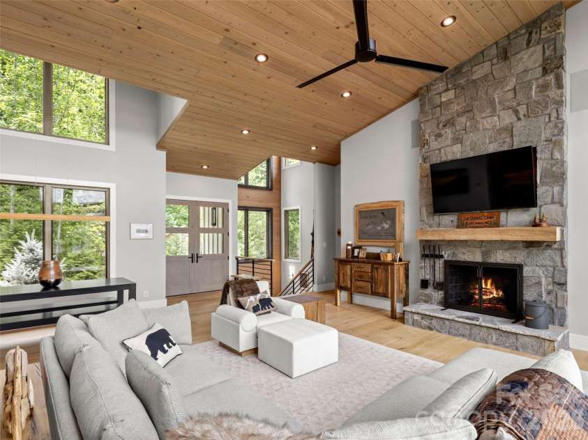 425 Dockside Drive, Nebo, NC 28761.  MLS# CAR4393009, YatesRealty ID 32158. Wonderful spacious open livingroom.