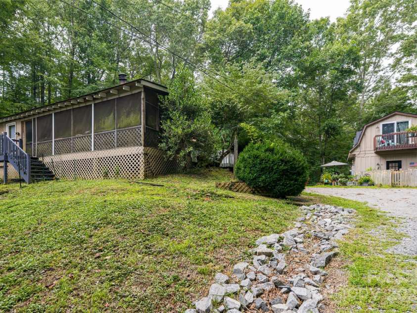 49 & 51 Mayapple Lane, Brevard, NC 28712.  MLS# CAR4288314, YatesRealty ID 32158. 