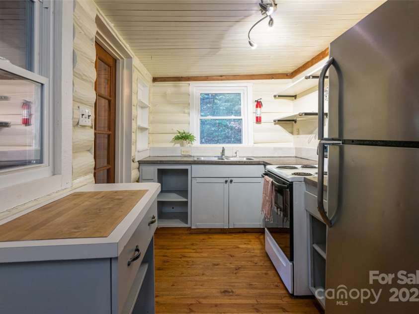 49 & 51 Mayapple Lane, Brevard, NC 28712.  MLS# CAR4288314, YatesRealty ID 32158. 