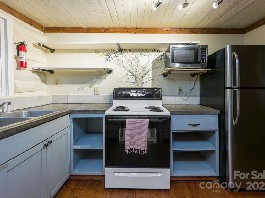 49 & 51 Mayapple Lane, Brevard, NC 28712.  MLS# CAR4288314, YatesRealty ID 32158. 