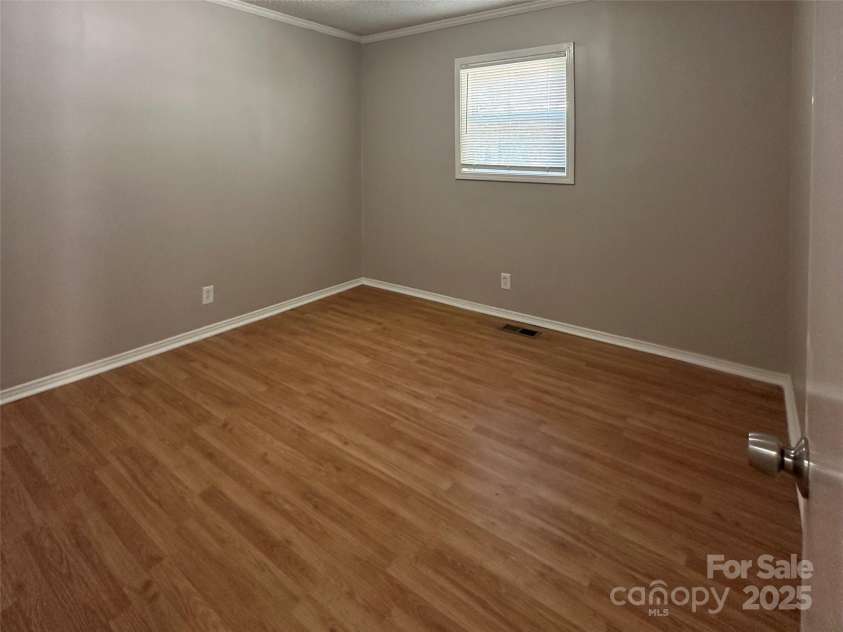 136 Melba Avenue, Concord, NC 28025.  MLS# CAR4292415, YatesRealty ID 32159. Bedroom 1