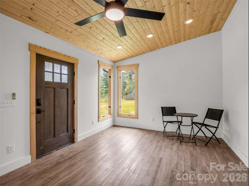 54 Old Lime Kiln Road, Arden, NC 28704.  MLS# CAR4394473, YatesRealty ID 32159. Entry into living room and kitchen-open concept design,