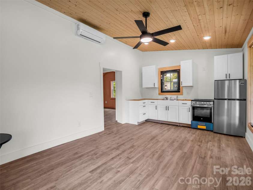 54 Old Lime Kiln Road, Arden, NC 28704.  MLS# CAR4394473, YatesRealty ID 32159. Open living space.